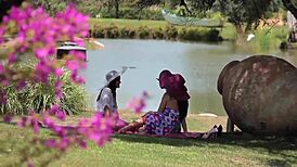 three girls eagerly lick twink's pussy in hot lesbian action!