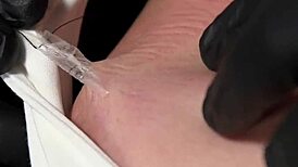 Gagged babe in stockings gets her ass whipped hard during kinky play