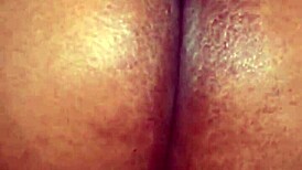 pretty ebony woman displays her tits and pussy for the camera