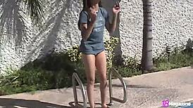Young woman wet t-shirt and pantie tease in the pool