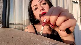 Beautiful Woman Smoking Cigarette In Fetish Video