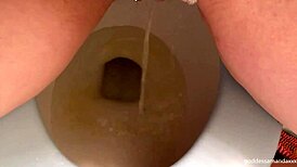 Solo babe peeing and farting on homemade toilet