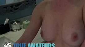 Big-titted babe bends over for boyfriend in bathroom titty fuck