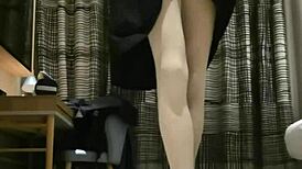 A handjob in a cums hard black dress from femboy shemale