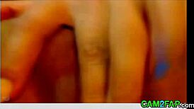 I am an asian girl on webcam playing with my pussy and fingering my anal