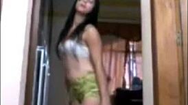 Brazilian girl performs a captivating solo dance in private setting.
