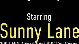 Sunny Lane, with her big booty, is dancing in a dress while playing with her tits and using a vibrator to cum