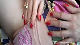 Sunny Lane, with her big booty, is dancing in a dress while playing with her tits and using a vibrator to cum