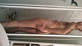 the sexy teen girl steps into the shower, feeling the warm water