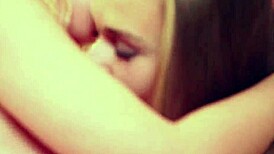 sensual lesbian kissing in stockings and lingerie, blonde beauties exploring each other