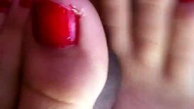 My friend gives an amazing footjob in the car, leading to cum