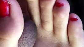 My friend gives an amazing footjob in the car, leading to cum