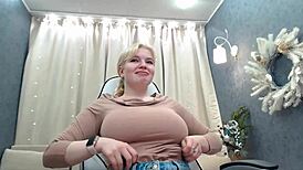 Blonde flaunts massive natural tits for wild action