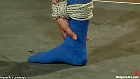 Coach Dominates Flexible Lesbian Slave With Whipping And Choking