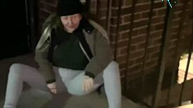 slut cracky takes stick up shaved pussy in public