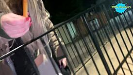 slut cracky takes stick up shaved pussy in public