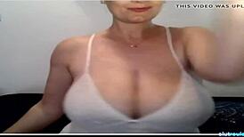 Huge Titted Milf Massages Boobs