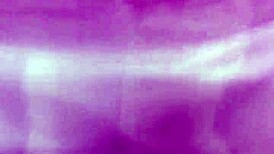 Mature woman receives oral attention in a subtle intimate setting.