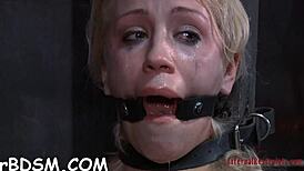 this ravishing blonde maid is bound in bondage. she reaches orgasm through masturbation and toys.