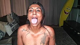 A kinky tongue play on the couch by an Indian girl