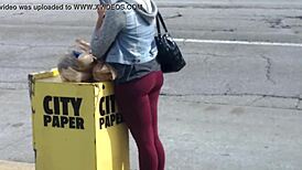 Single black beauty catches the bus after a shopping spree