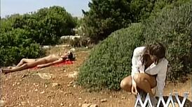 Trashy chick pees on guy's face outdoors