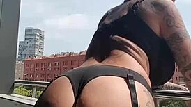 Neighbors spy on this milf masturbating her big tits in a voyeur fetish