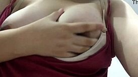 Wow, check this Asian babe with sexy boobs showing off!