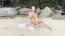 Kinky Monika Fox on a wild beach satisfies herself with big toys!