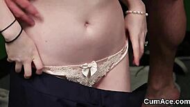 naughty stunner gets covered in cum from a wild blowbang facial