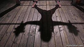 I watched a brunette in spread eagle bondage getting caned hard