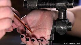 I watched a brunette in spread eagle bondage getting caned hard