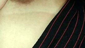 She fell asleep watching Netflix, and I filmed her saggy natural tits secretly.