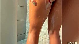 hey, this hot girl is masturbating in the shower with anal plug and vibrator, all for you to cum hard