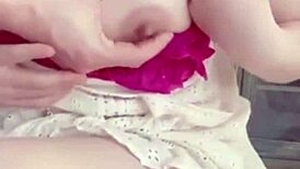 Girlfriend teases on balcony, playing with wet pussy