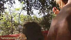 amateur teen 18+ boldly shows off blonde tits outdoors at party