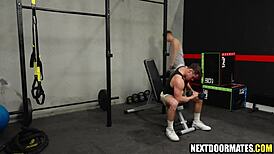 Buff Bodybuilder Works Out In Gym With Hunk