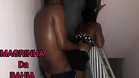 in the unfinished building, the young latina guy gives oral to the black cock, leading to anal and orgasm outdoors.