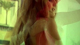 Andie Valentino rips her clothes off in a solo striptease masturbation session