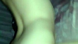 She bends over on all fours for intense doggystyle sex in the bedroom.