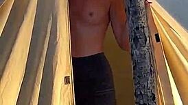 Feeling the passion as she gives a blowjob on the beach