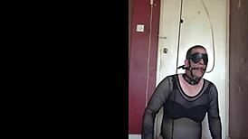 blindfolded sissy crossdresser swallows piss through gag, anal hooked