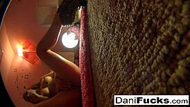 Sexy Dani Daniels teases while playing with her wet pussy. She cums hard!