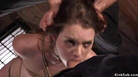 Brunette Slave Takes Huge Cock Deep in Throat