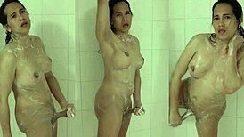 I love watching this hot shemale masturbate in the shower with soap