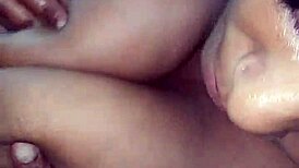 Mature Ebony Titfuck in Car