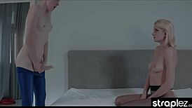 sexy blonde takes girlfriend's strapless dick with pierced nipples