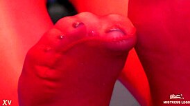 Toes wiggling in red shiny pantyhose