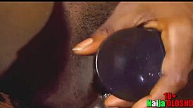 Ebony babe fucks her horny pussy with a huge dildo in multiple positions