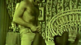 this vintage interracial features a white cock in a black pussy.